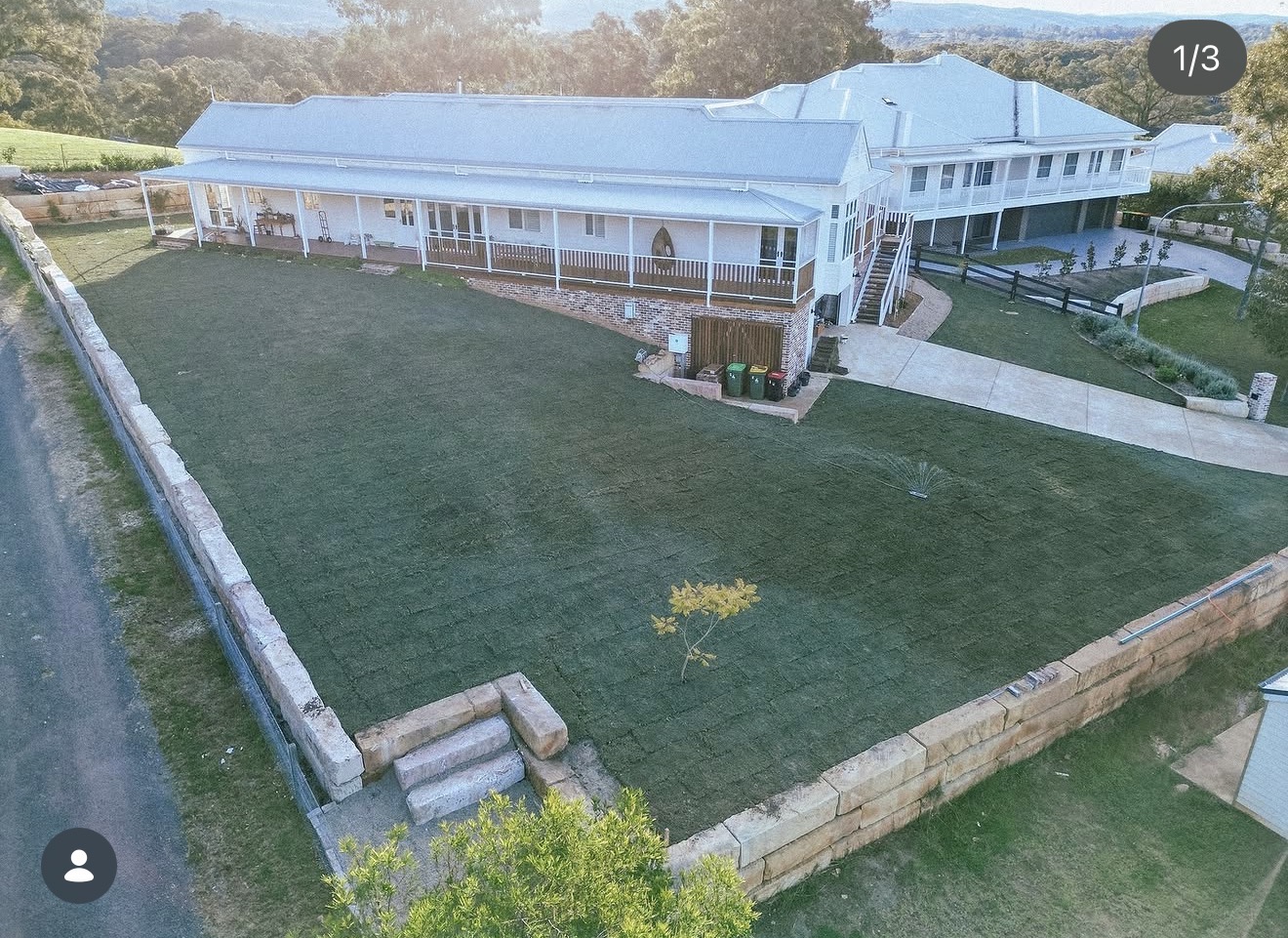Aerial drone view of completed Hawkesbury rural property with sandstone border retaining walls