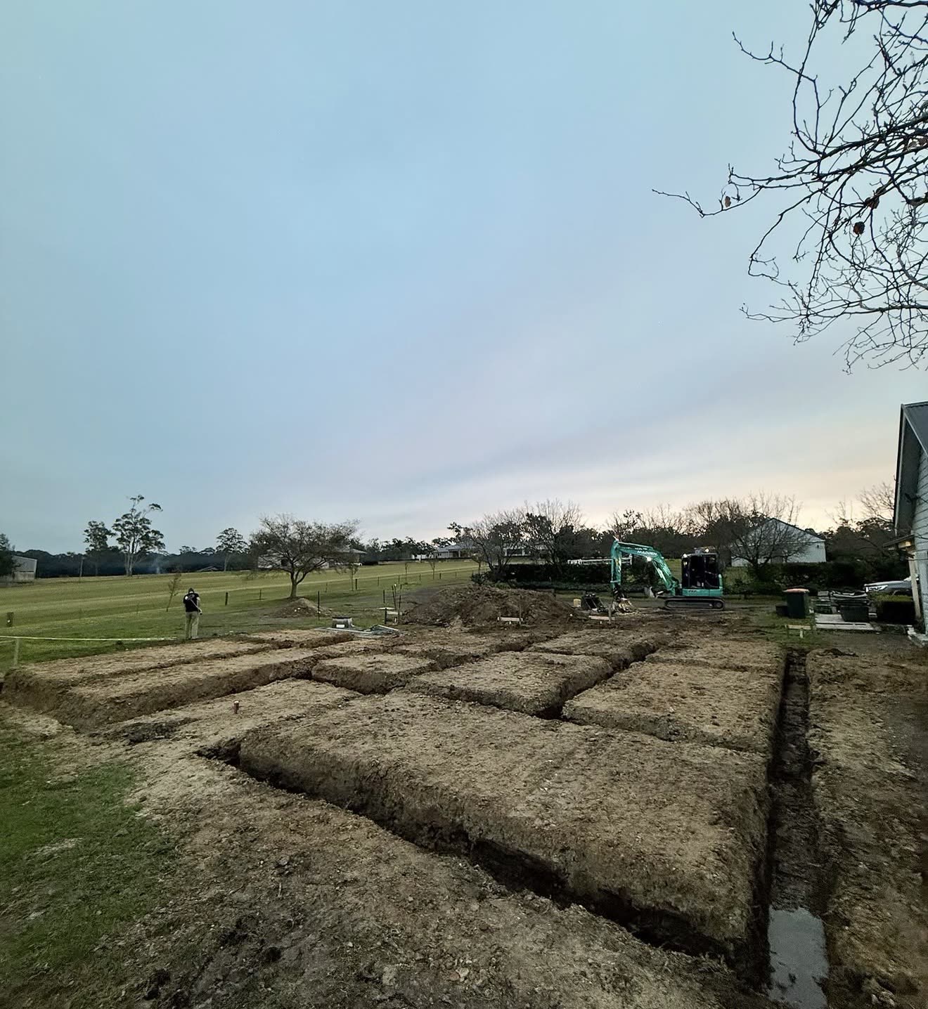 Detailed excavation of footing trenches laid out in grid pattern